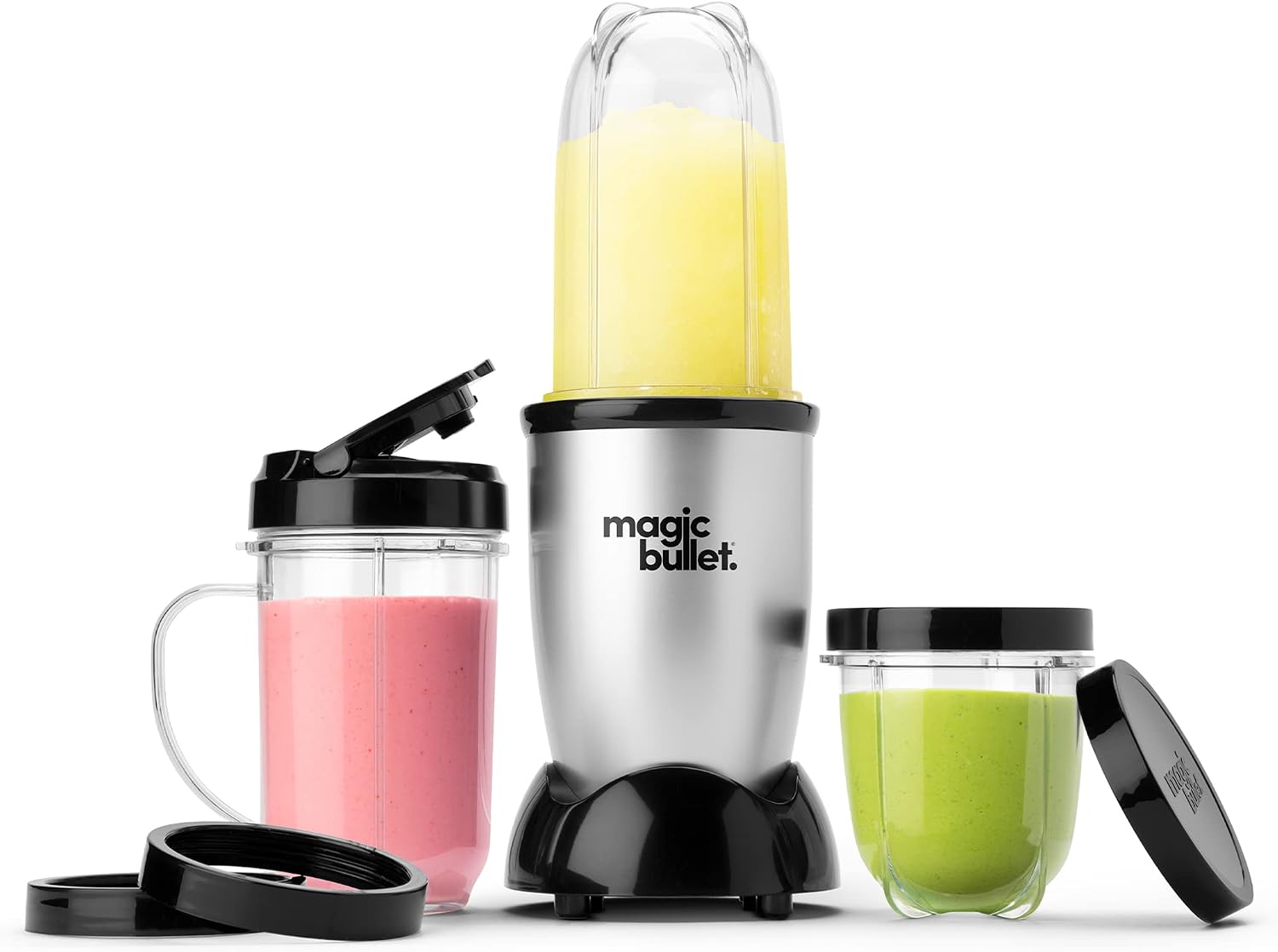 Compact Magic Bullet blender base with tall and short cups of colorful smoothies on a white background