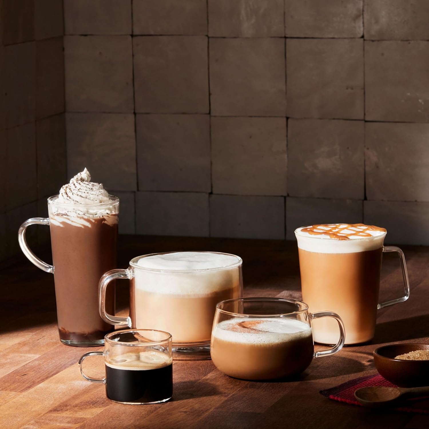 Cups of prepared coffee and latte drinks made with Folgers Simply Smooth ground coffee
