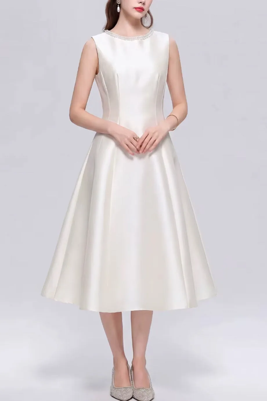 Pret A Beaute - A satin midi dress from the Pret A Beaute womenswear collection