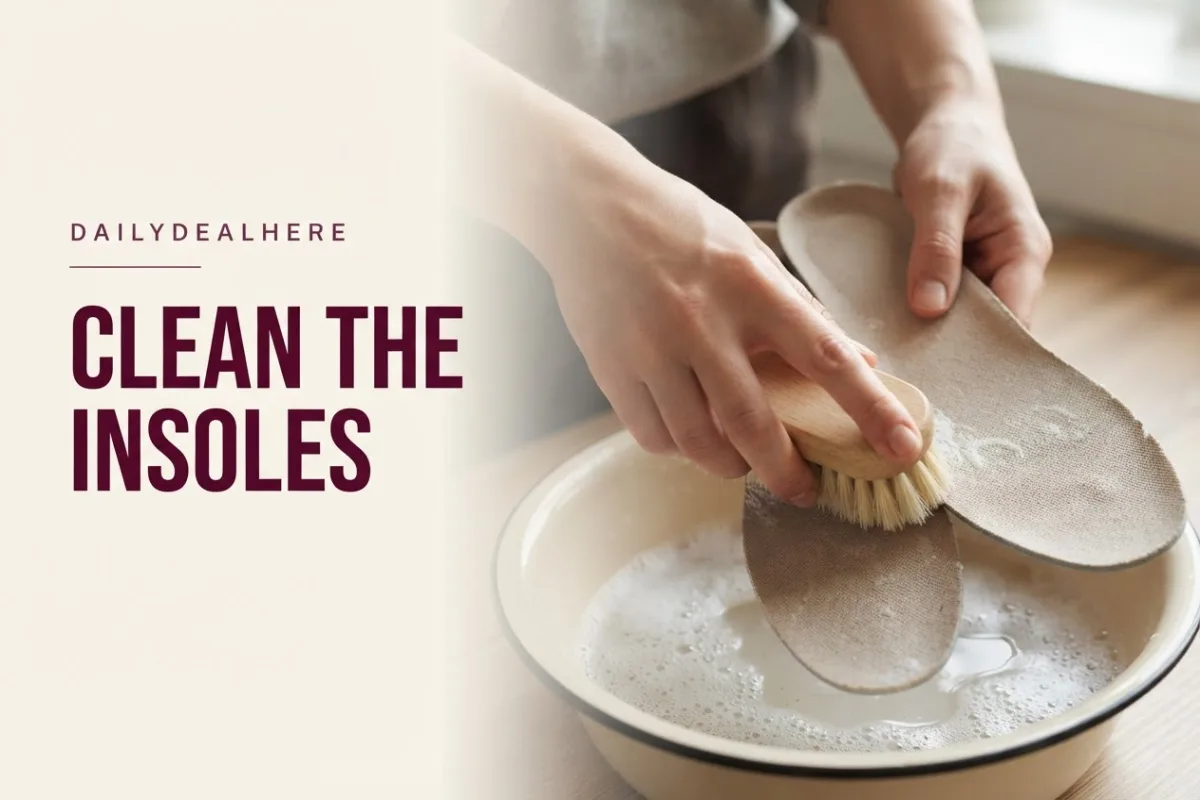 Hands scrubbing removed shoe insoles with a soft brush